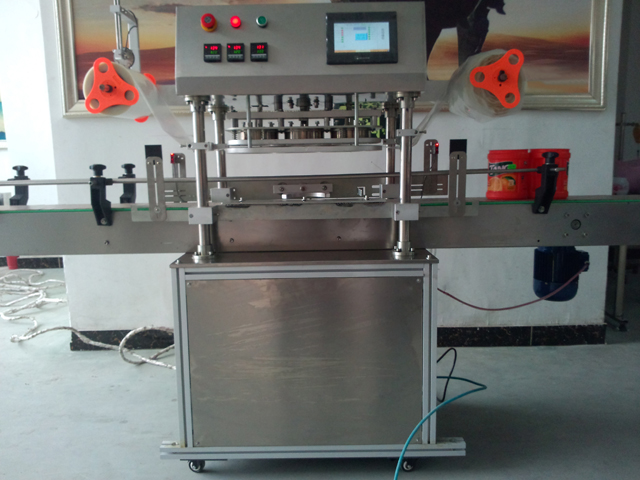 automatic three heads jars sealing equipment машина для запечатывания банок.jpg
