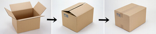 процесс работы машины для запечатывания картонных коробок.jpg