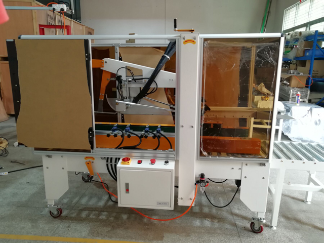 запечатывающее устройство для картонных коробок с устройством для склеивания горячим клеем (1).jpg